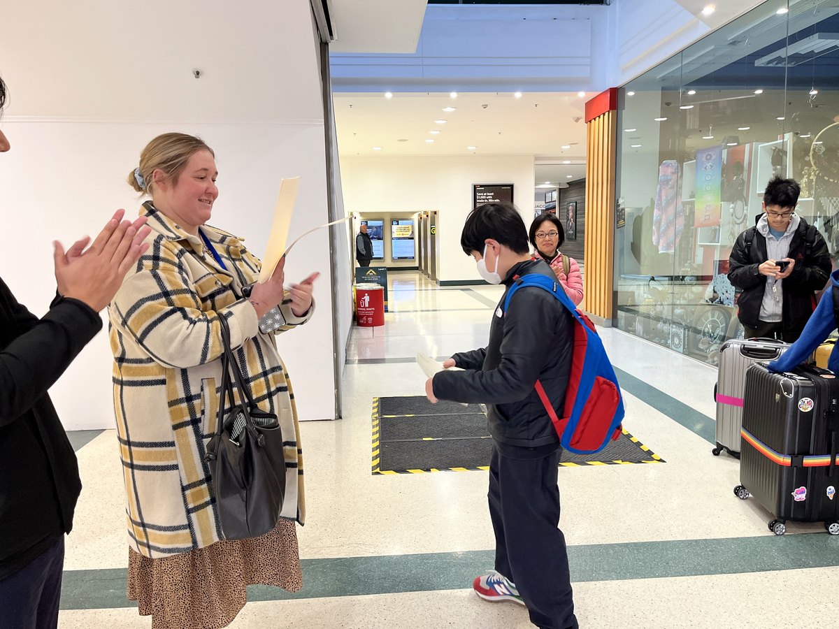 WIE staff helping an international student with study information