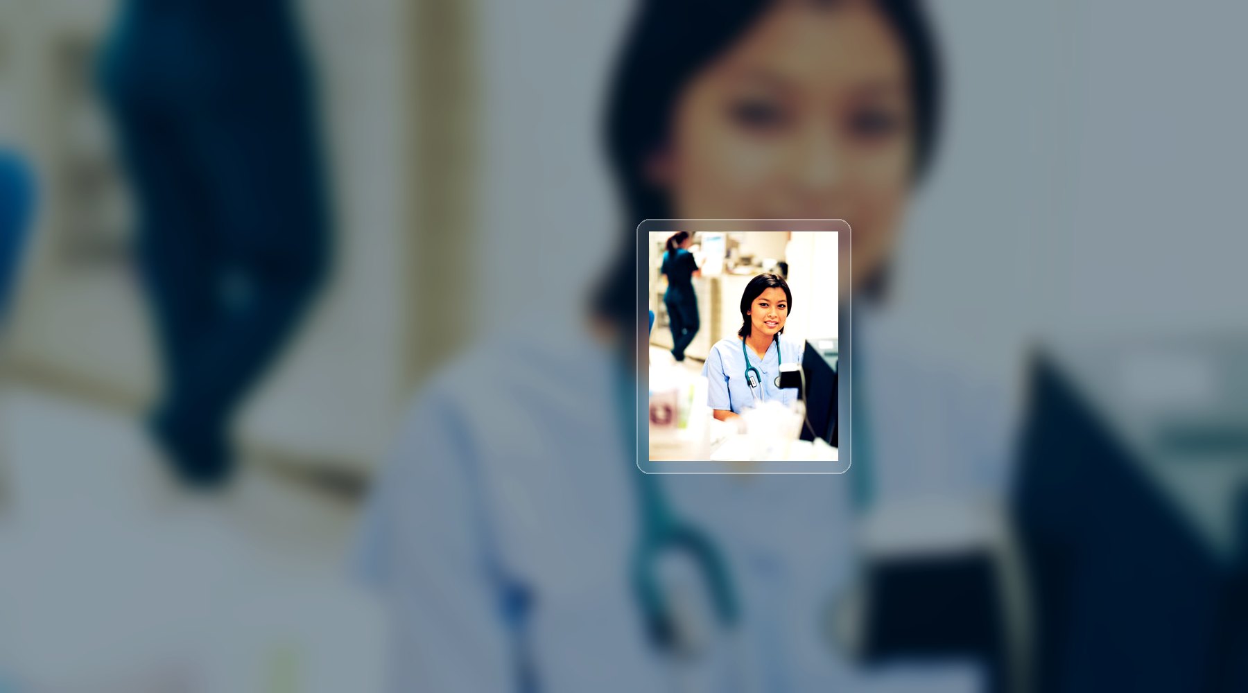 Healthcare professional at a computer workstation
