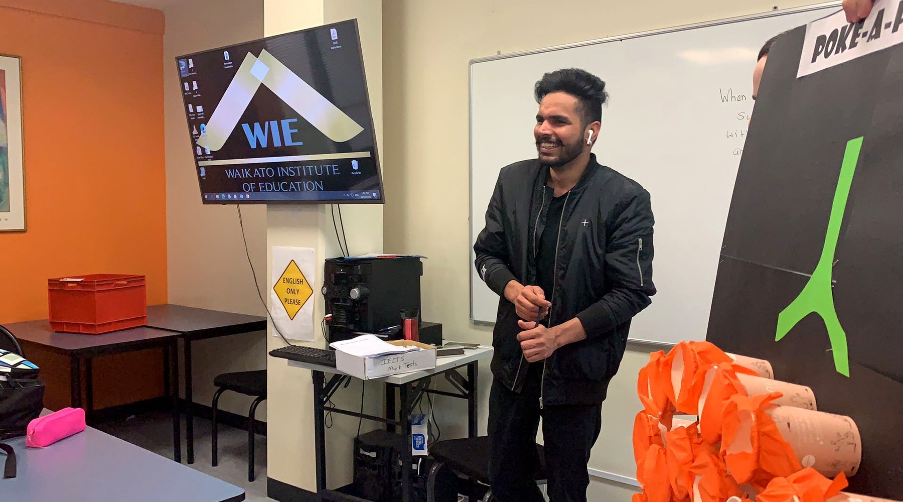 WIE student presenting during an English classroom activity